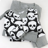 Go to slide 4, Organic Cotton Holiday Matching Family Pajamas, Happy Skulls