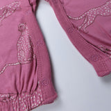 Go to slide 4, Chest Ruffle Coverall, Purple Spot