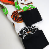 Go to slide 17, Organic Cotton Holiday Matching Family Pajamas, Spoo-oo-keey Donuts Green