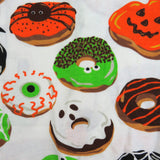 Go to slide 3, Organic Cotton Holiday Matching Family Pajamas, Spoo-oo-keey Donuts Green